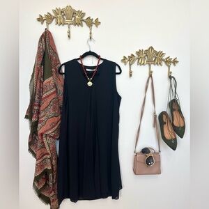Elegant modern dress with open front tulip opening L ptp 21” l 40”